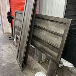 Bed set that comes with a dresser with mirror and a bedside table