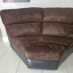 Three piece microfiber sofa set with 4 recliners in it..