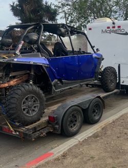 2014 Polaris Rzr xp4 with heavy duty double axel trailer 12 footer.