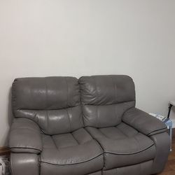 Used loveseat With Power Adjustable Leg Extension