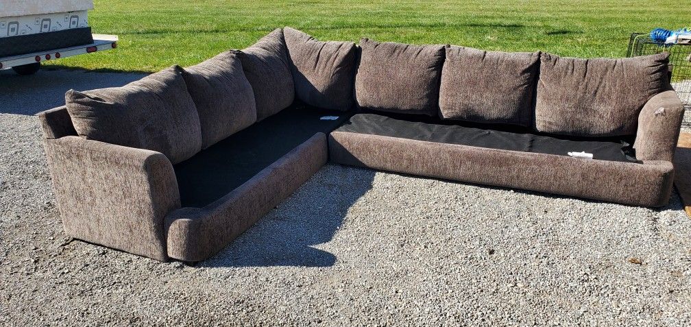 free brownish Gray couch sectional. no cushions. great for the dogs