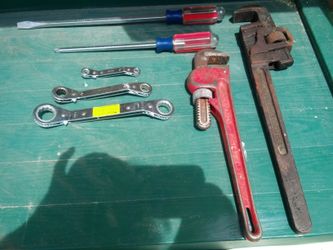Companion 14" pipe wrench 18" roxbury pipe wrench. 2 long new srewdrivers