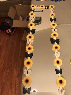 Sunflowers with black and white butterflies mirror