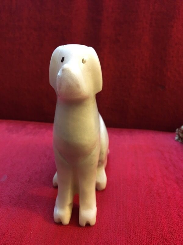 Solid white marble dog