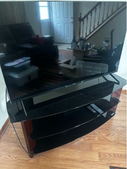 Vintage TV stand black tempered glass shelves