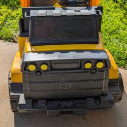 12-Volt CAT Mining Dump Truck from Kid Trax