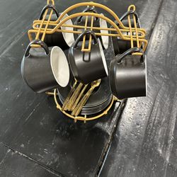 Coffee mug set with plates and spoons