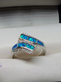Elegant opal ring with sparkling C's z's