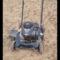 LOWES LAWN MOWER BRIGGS AND STRATTON, DOES NOT RUN, . NEEDS WORK, AS IS