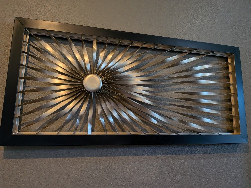 Grayson Lane Metal Sunburst Coiled Ribbon Wall Decor With Black Frame