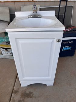 White Bathroom Vanity with Sink and Faucet
