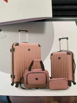New four piece hard sided luggage set