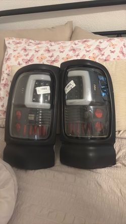 (contact info removed)  hmu Dodge ram 1500 C shaped taillights