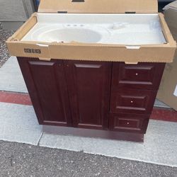 36.5 in. W x 18.75 in. D x 34.375 in ** Home Decorators Collection Sedgewood Single Sink Bath Vanity in Dark Cognac with Arctic Solid Surface Top 