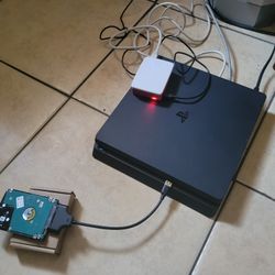 Goldhen PS4 Slim 1TB Hdd 11.00  Comes With 40+ Games