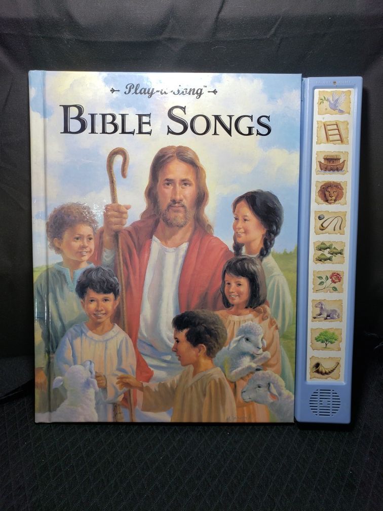 Play a song Bible songs . New batteries . 12" X 12" book