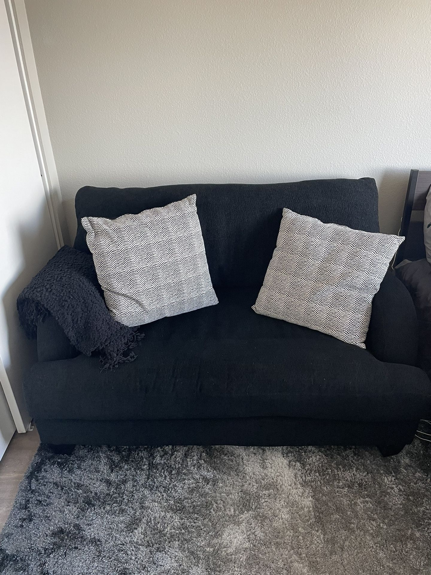 Black loveseat 