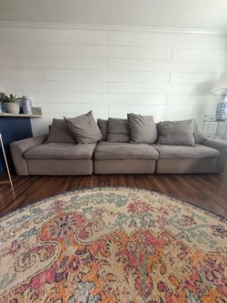 Large , grey , sectional coach