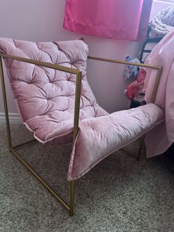 Pink and gold sling chair