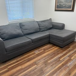 Grey Couch With Sleeper