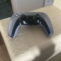 Metallic silver PS5 controller 