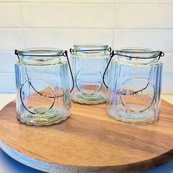 3 Glass Jars for Flowers. Can also hold Candles