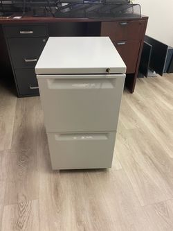 Beige metal office filing cabinet