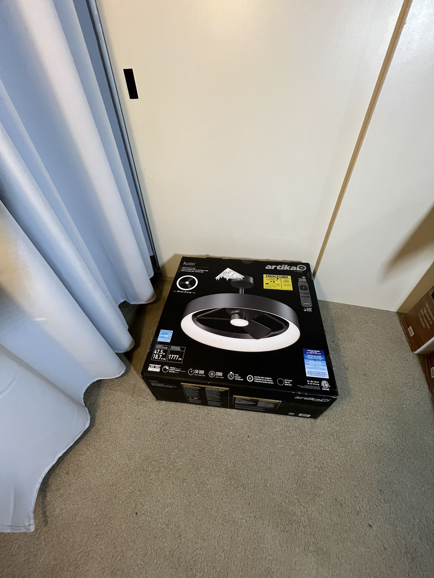 Open box. Never installed or used Artika Austin 23" LED Fandelier / Ceiling Fun.