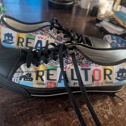 Black canvas low-top sneakers - size M10/F12/EU44 with custom "REALTOR" license plate design.