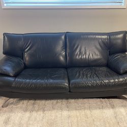 Leather couch and coffee table 
