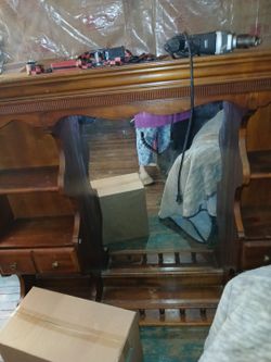 It's a mirror in sales and two drawers in it that's on top of a dresser