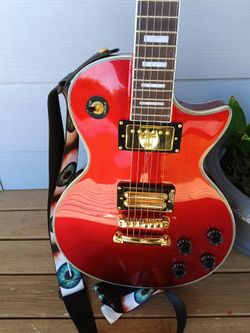 Metallic red firefly LP copy with pro tube lipstick humbucker and Wilkinson roller saddle tunomatic bridge