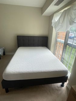 Queen bed with mattresses