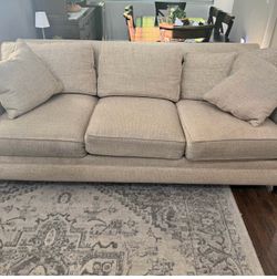 Thomasville Couch. Cream color down filled couch with some pet wear and tear.