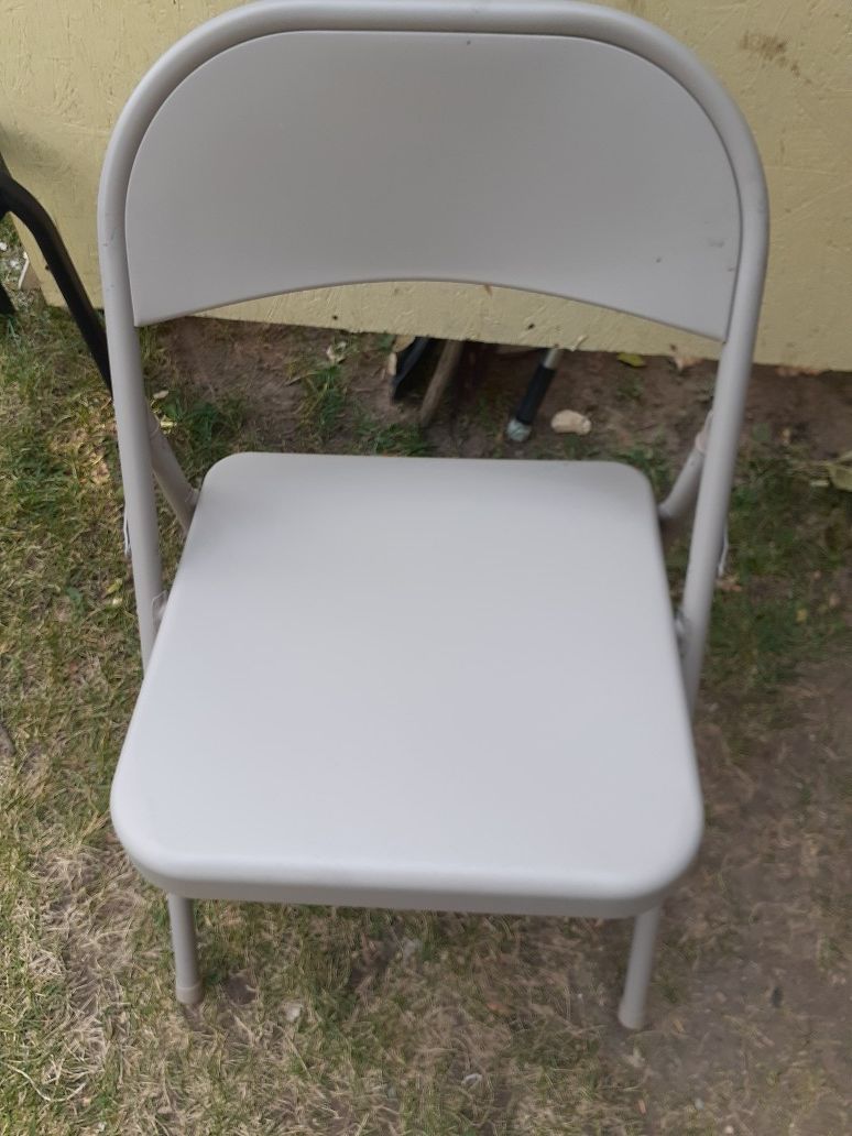 Metal chair very sturdy, read on.