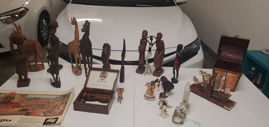 Is African artifacts/ English pub board game and Antique boat artifacts