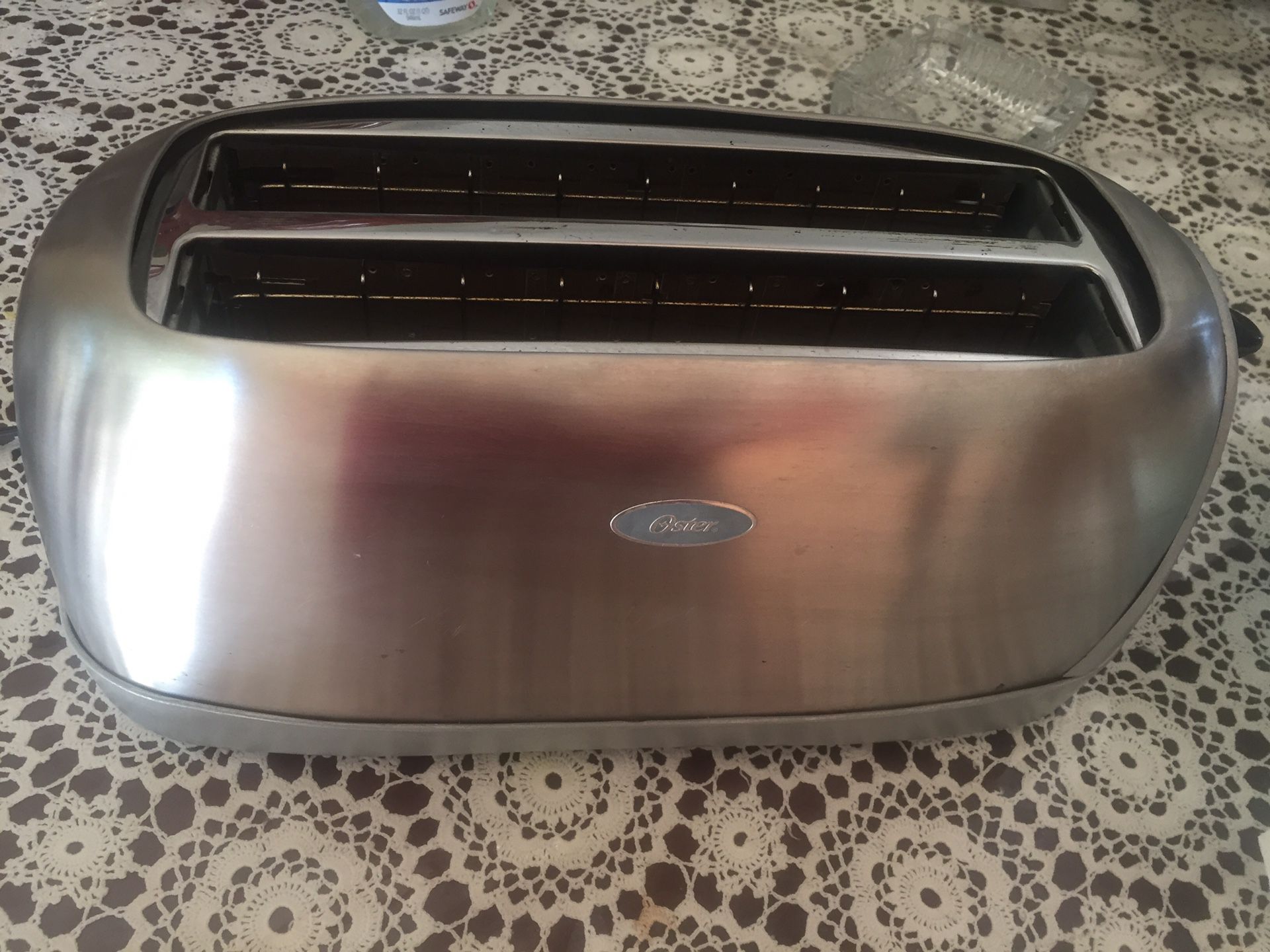 Oster Stainless Steel Silver 4 slot Toaster 7.3 in. H x 6.9 in. W x 16 in. D