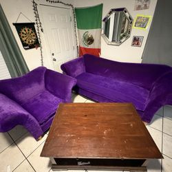 Purple couches And Coffee Table 