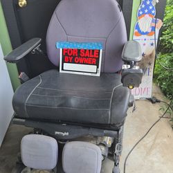 Motorized power wheelchair with charger