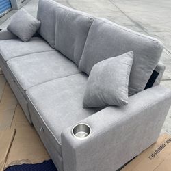 New Grey Couch W Pullout Bed.  Free Delivery!
