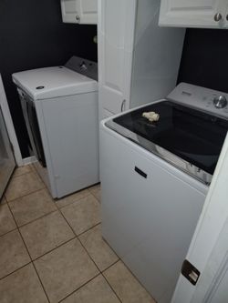 Whirlpool washer dryer set and storage cabinet