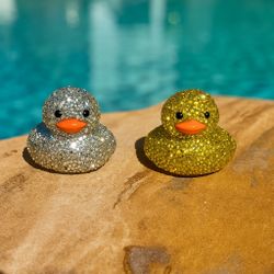 Handmade custom rhinestone blinged ducks.