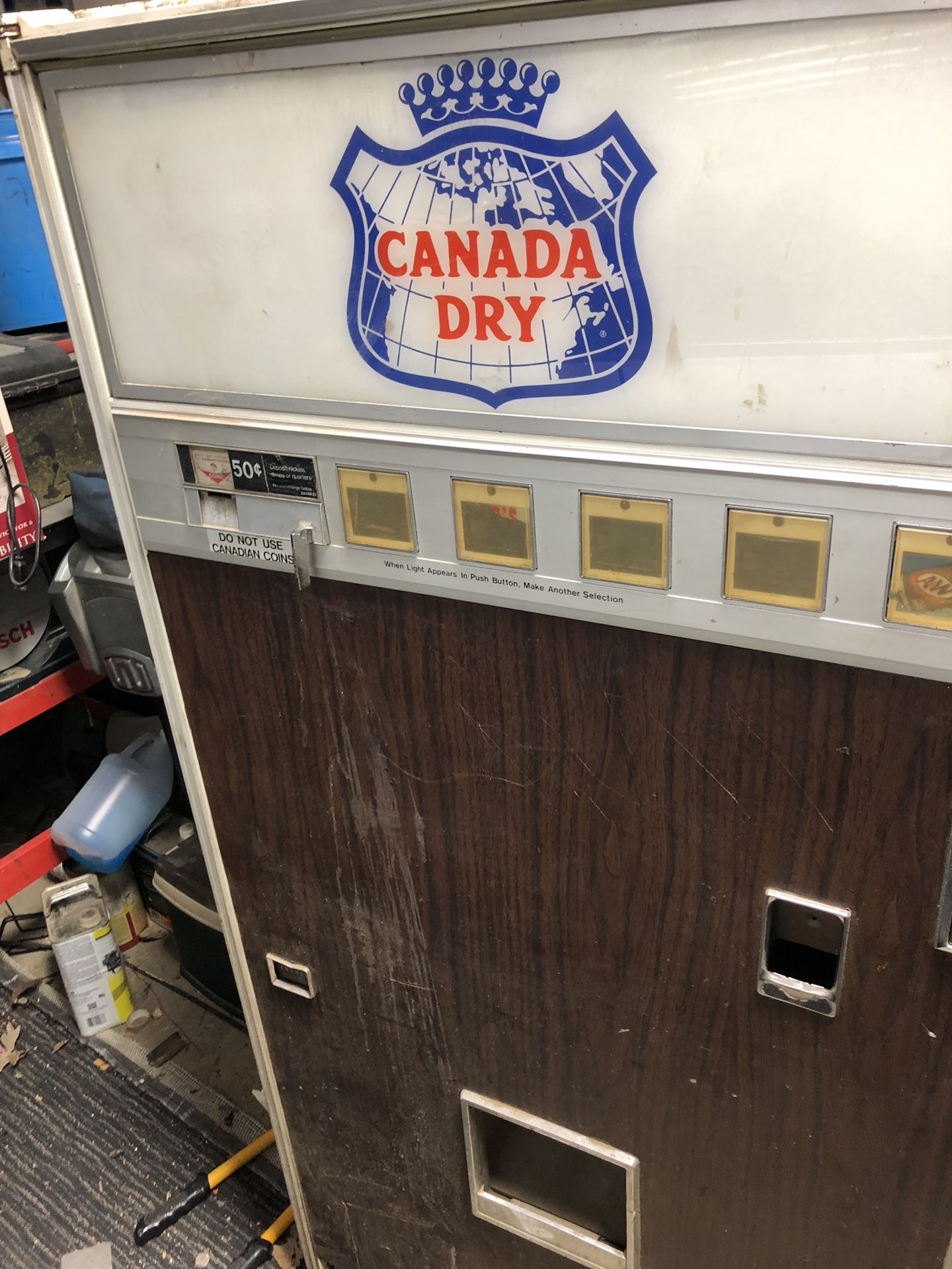 Three vintage soda machines