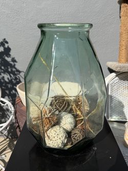 Vase with decorative pieces inside