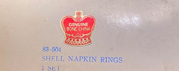 NEW NEVER USED BONE CHINA NAPKIN RINGS SET OF 4