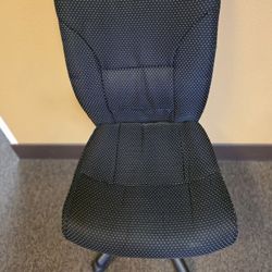 Chair For Office. Rotates & On Rollers. Black With Small Dots.