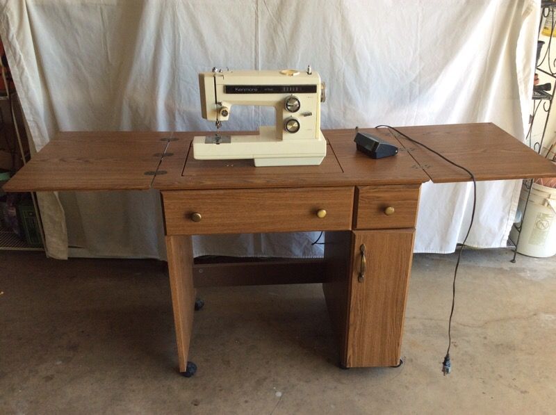 Kenmore 14 stitch sewing machine & cabinet