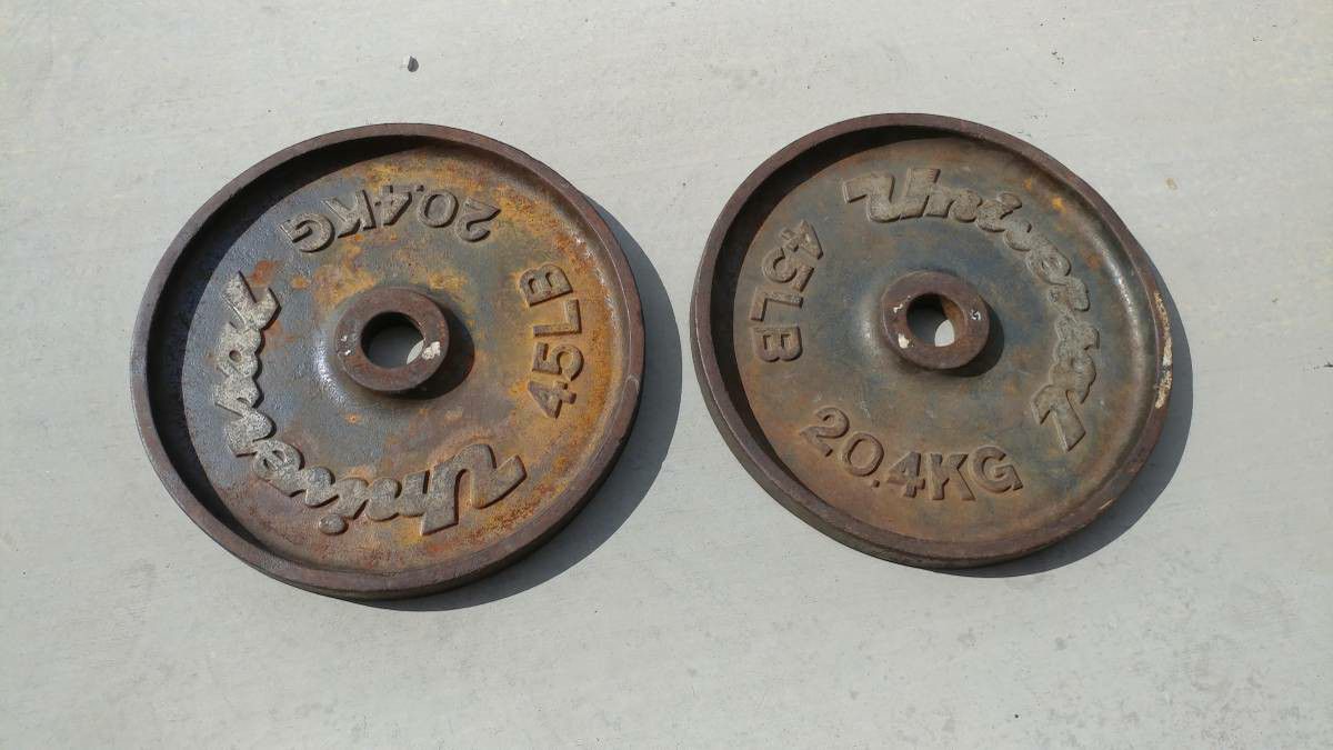 Matching pair of vintage 45lb weight plates