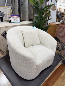 Tatum oversized boucle swivel chair