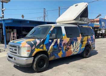 Extraordinary camper van! 2012 Ford E150. Sleeps 5! Kitchen, solar panel,